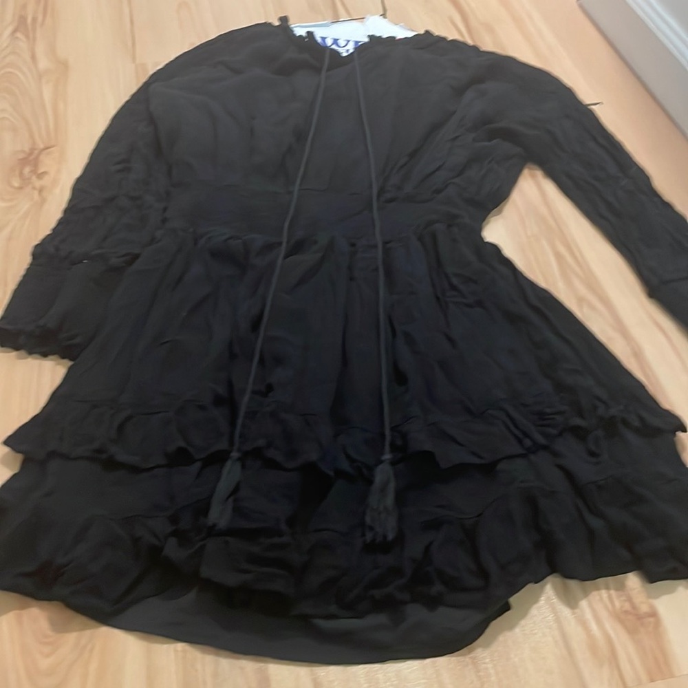 Beautiful Yakira Bella black long sleeve dress with beautiful tassels
